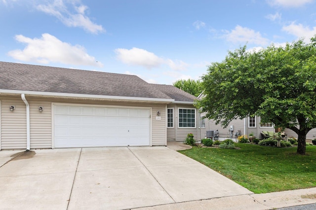 1040 Primrose Ln, Waconia, MN 55387 - view of front facade featuring concrete driveway, a garage, a front lawn, and roof with shingles