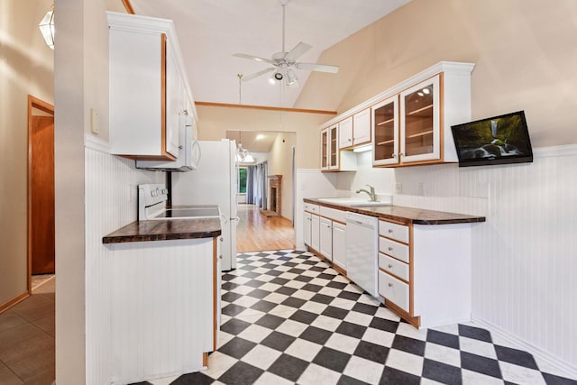 1040 Primrose Ln, Waconia, MN 55387 - kitchen with white appliances, ceiling fan, dark countertops, light flooring, and glass insert cabinets