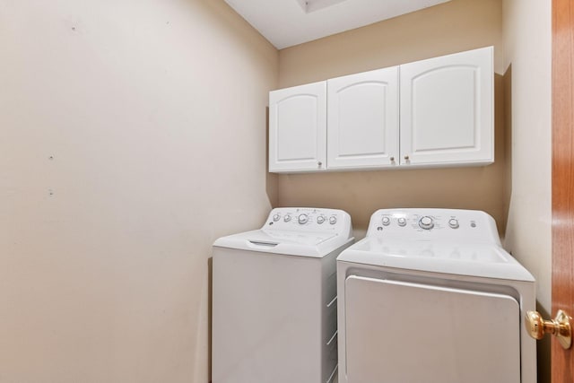 1040 Primrose Ln, Waconia, MN 55387 - laundry room featuring washing machine and clothes dryer and cabinet space