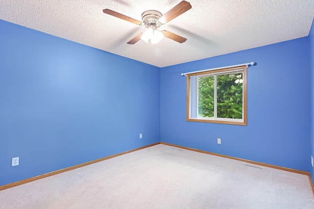 1040 Primrose Ln, Waconia, MN 55387 - carpeted spare room featuring a ceiling fan and a textured ceiling