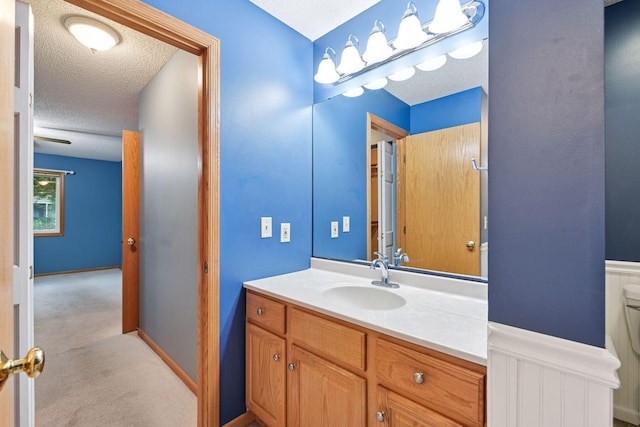 1040 Primrose Ln, Waconia, MN 55387 - bathroom with a textured ceiling and vanity