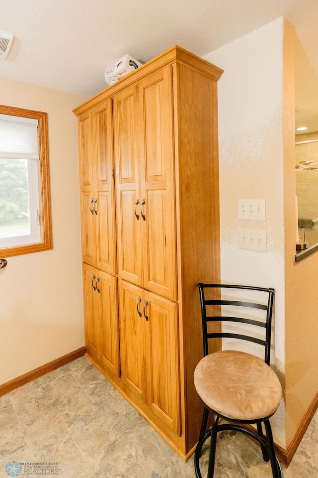 3853 91st Ave SE, Jamestown, ND 58401 - living area with baseboards