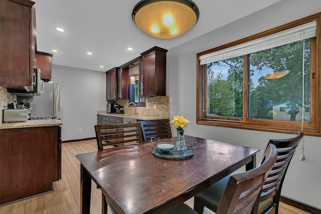12940 8th Ave N, Zimmerman, MN 55398 - dining room with light wood finished floors and recessed lighting