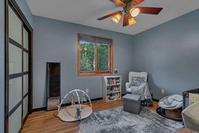 12940 8th Ave N, Zimmerman, MN 55398 - living area with wood finished floors and ceiling fan