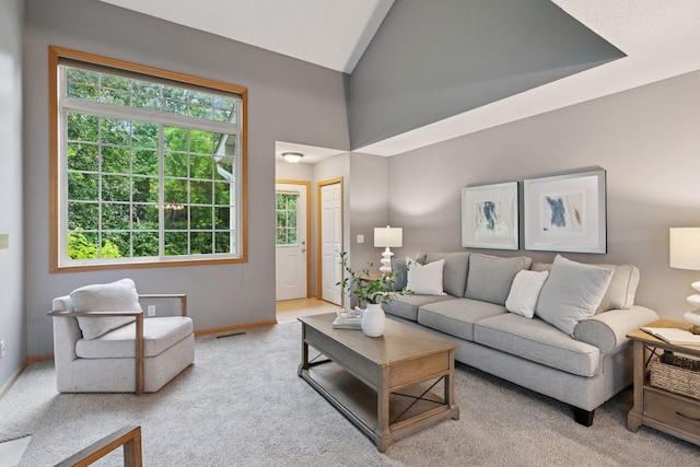5425 Fawn Ct SE, Prior Lake, MN 55372 - living area featuring vaulted ceiling and carpet