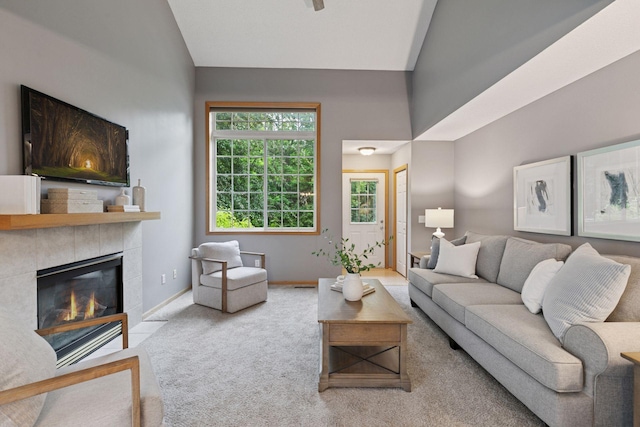 5425 Fawn Ct SE, Prior Lake, MN 55372 - living area featuring vaulted ceiling, carpet flooring, and a fireplace