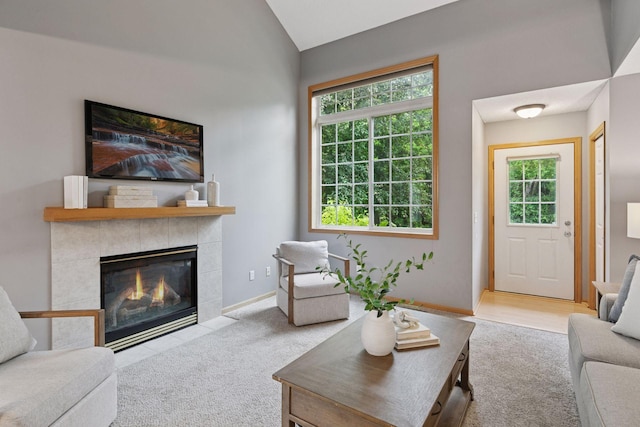 5425 Fawn Ct SE, Prior Lake, MN 55372 - carpeted living area featuring a fireplace, healthy amount of natural light, and vaulted ceiling