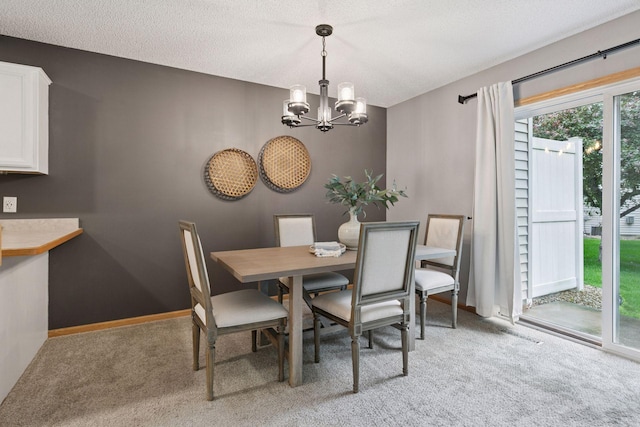 5425 Fawn Ct SE, Prior Lake, MN 55372 - dining room featuring a chandelier, light colored carpet, and a textured ceiling