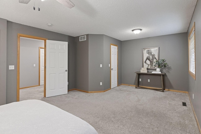 5425 Fawn Ct SE, Prior Lake, MN 55372 - bedroom with carpet floors, a textured ceiling, and ceiling fan