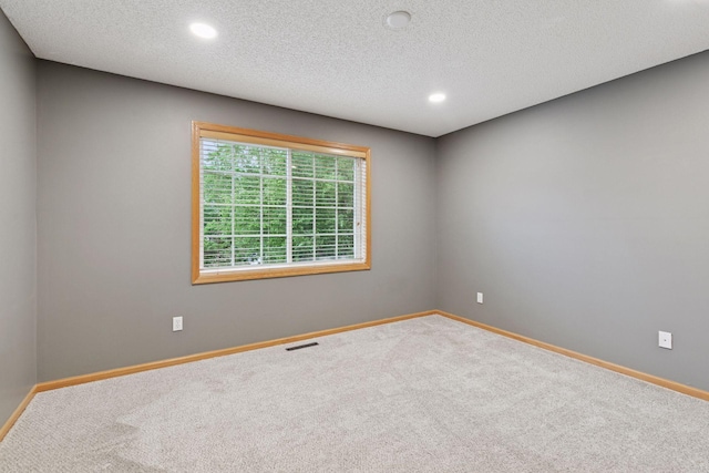 5425 Fawn Ct SE, Prior Lake, MN 55372 - carpeted empty room with recessed lighting and a textured ceiling