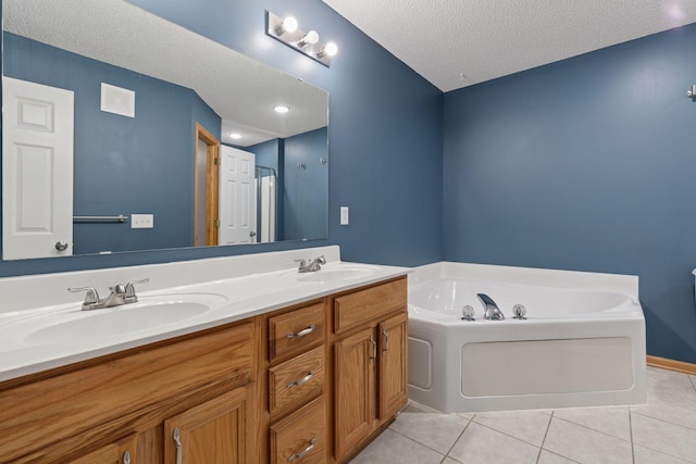 5425 Fawn Ct SE, Prior Lake, MN 55372 - bathroom featuring double vanity, a bath, tile patterned floors, and a textured ceiling