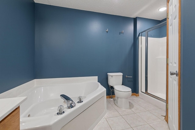 5425 Fawn Ct SE, Prior Lake, MN 55372 - full bathroom with a garden tub, a shower stall, a textured ceiling, vanity, and tile patterned flooring