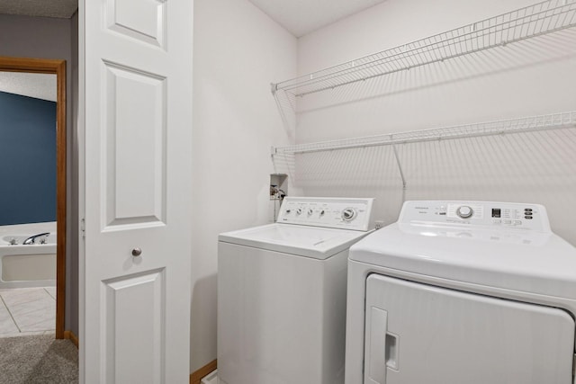 5425 Fawn Ct SE, Prior Lake, MN 55372 - laundry area featuring washer and clothes dryer and baseboards