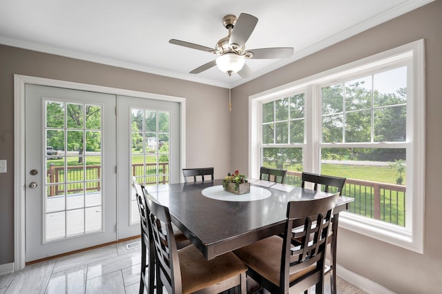13912 80th St NE, Otsego, MN 55330 - dining area with baseboards, ornamental molding, and ceiling fan