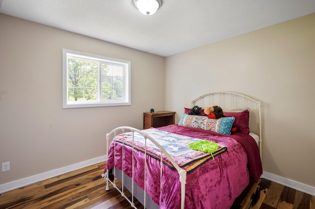 13912 80th St NE, Otsego, MN 55330 - bedroom featuring baseboards and wood finished floors