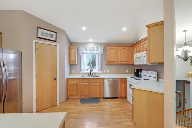 1310 Widgeon Way, Buffalo, MN 55313 - kitchen featuring appliances with stainless steel finishes, a chandelier, light wood-style floors, light countertops, and recessed lighting