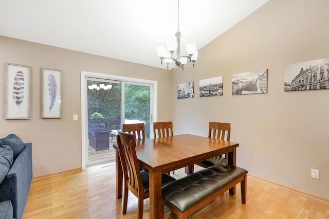 1310 Widgeon Way, Buffalo, MN 55313 - dining space featuring a chandelier, light wood finished floors, and lofted ceiling