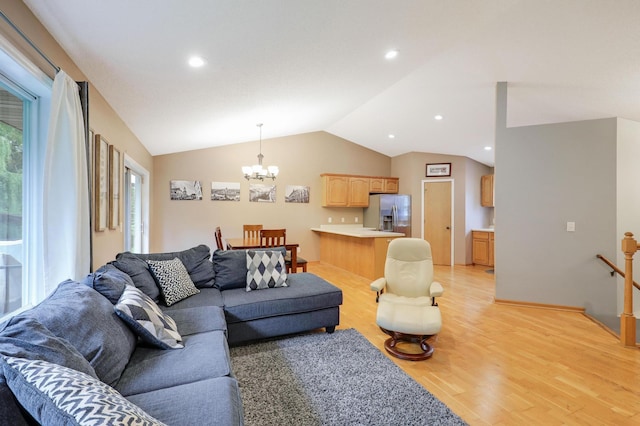 1310 Widgeon Way, Buffalo, MN 55313 - living room with vaulted ceiling, light wood-style flooring, a chandelier, and recessed lighting