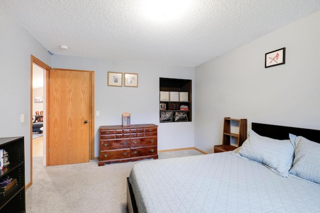 1310 Widgeon Way, Buffalo, MN 55313 - carpeted bedroom with a textured ceiling
