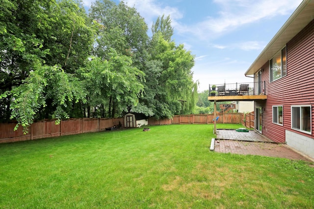 1310 Widgeon Way, Buffalo, MN 55313 - fenced backyard featuring a storage shed, a patio, and a deck