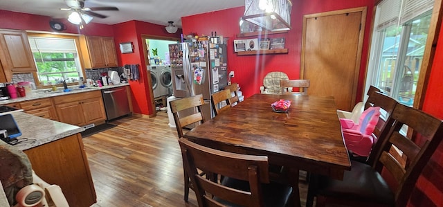210 E St S, Underwood, MN 56586 - dining room with separate washer and dryer, ceiling fan, and light wood-type flooring