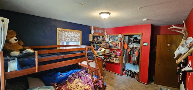 210 E St S, Underwood, MN 56586 - bedroom with carpet, a textured ceiling, and a closet