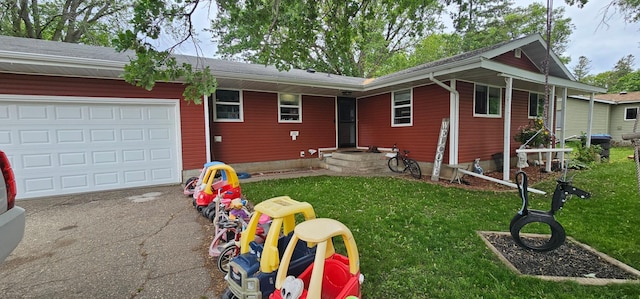 210 E St S, Underwood, MN 56586 - view of front of property with a garage, driveway, and a front lawn