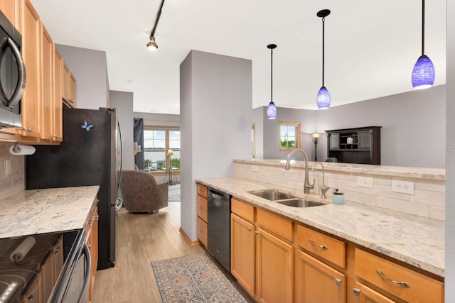 4100 Spring St Unit 310, Spring Park, MN 55384 - kitchen with dishwashing machine, black microwave, tasteful backsplash, and electric range