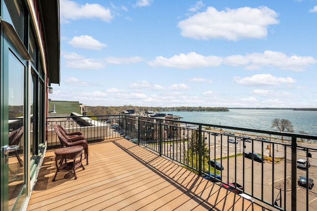 4100 Spring St Unit 310, Spring Park, MN 55384 - wooden deck with a water view