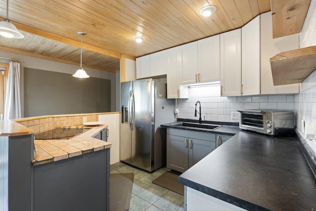 1412 11th St S, Virginia, MN 55792 - kitchen featuring a sink, stainless steel fridge with ice dispenser, wood ceiling, decorative backsplash, and black electric cooktop
