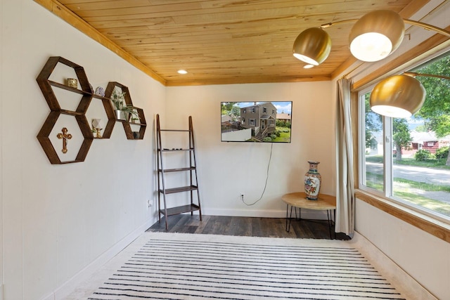 1412 11th St S, Virginia, MN 55792 - living area featuring wood ceiling, wood finished floors, and baseboards