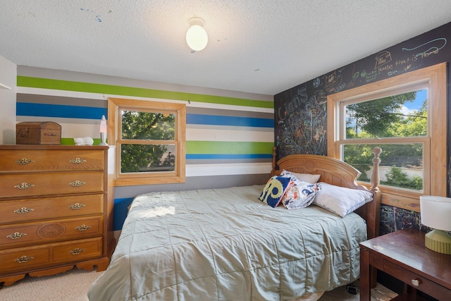 1412 11th St S, Virginia, MN 55792 - bedroom with wallpapered walls and a textured ceiling