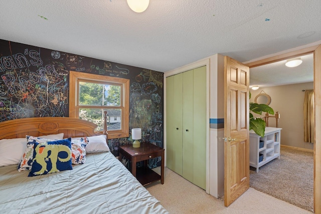 1412 11th St S, Virginia, MN 55792 - bedroom featuring wallpapered walls, a closet, light colored carpet, and a textured ceiling