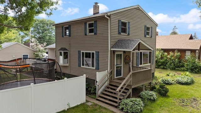 1412 11th St S, Virginia, MN 55792 - rear view of property with a chimney