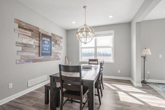 5201 Ramier Ave NE, Otsego, MN 55374 - dining room with a chandelier, wood finished floors, baseboards, and recessed lighting