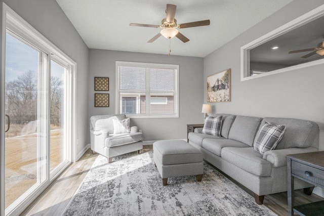 5201 Ramier Ave NE, Otsego, MN 55374 - living area featuring ceiling fan, wood finished floors, and baseboards