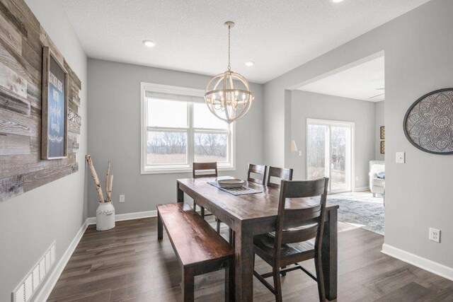 5201 Ramier Ave NE, Otsego, MN 55374 - dining space with a chandelier, recessed lighting, and dark wood-style floors