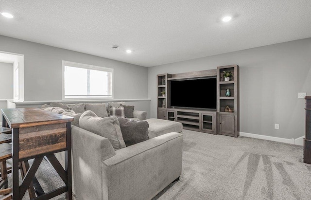 5201 Ramier Ave NE, Otsego, MN 55374 - living area featuring a textured ceiling, recessed lighting, and light colored carpet