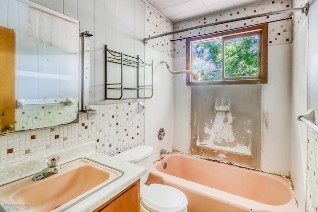 1002 10th St N, Fargo, ND 58102 - full bathroom featuring vanity, shower / bath combination, and decorative backsplash