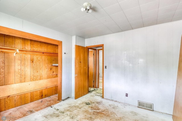 1002 10th St N, Fargo, ND 58102 - unfurnished bedroom with wooden walls