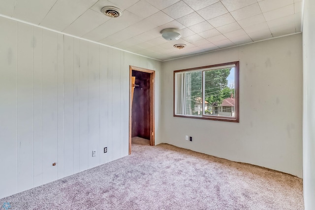 1002 10th St N, Fargo, ND 58102 - empty room with carpet floors