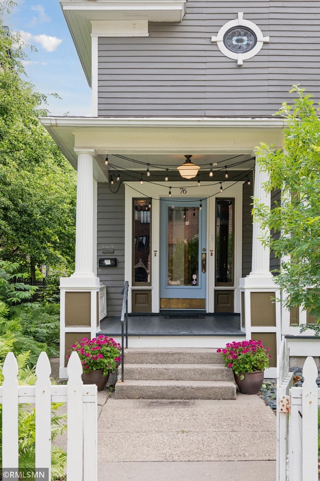 76 Western Ave N, Saint Paul, MN 55102 - doorway to property featuring covered porch