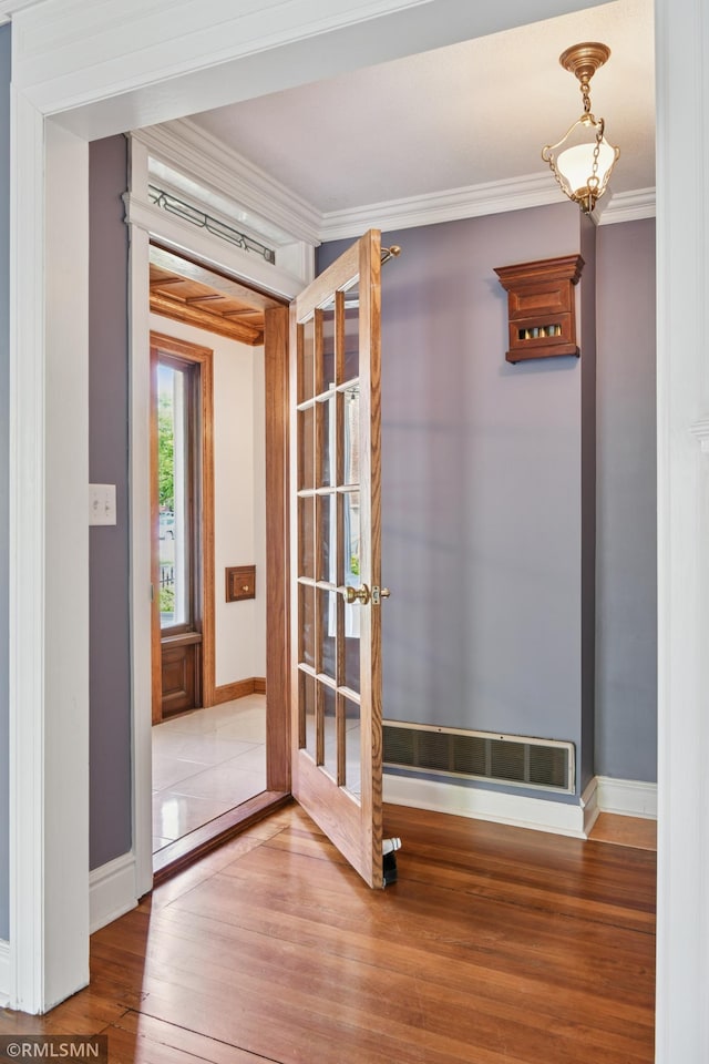 76 Western Ave N, Saint Paul, MN 55102 - doorway to outside featuring wood finished floors, crown molding, and french doors
