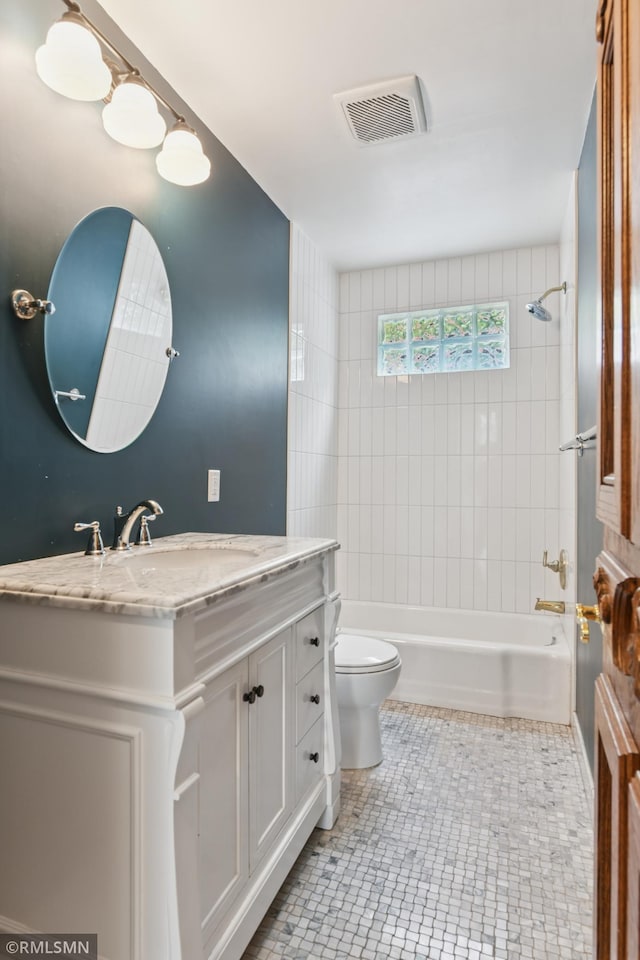 76 Western Ave N, Saint Paul, MN 55102 - full bathroom with vanity, shower / bath combination, and tile patterned floors