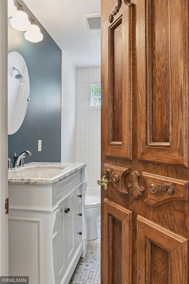 76 Western Ave N, Saint Paul, MN 55102 - bathroom with vanity and tile patterned floors