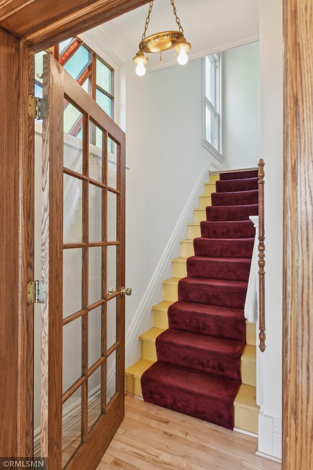 76 Western Ave N, Saint Paul, MN 55102 - stairs featuring wood finished floors and plenty of natural light