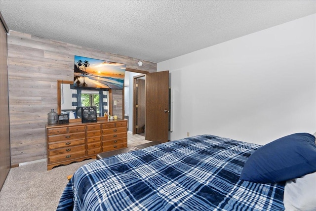 7079 Robinwood Trl, Woodbury, MN 55125 - bedroom featuring wood walls, carpet flooring, and a textured ceiling