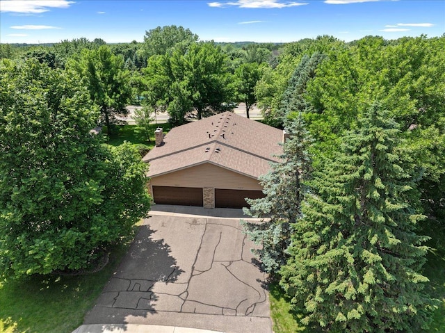 7079 Robinwood Trl, Woodbury, MN 55125 - view of subject property featuring a forest