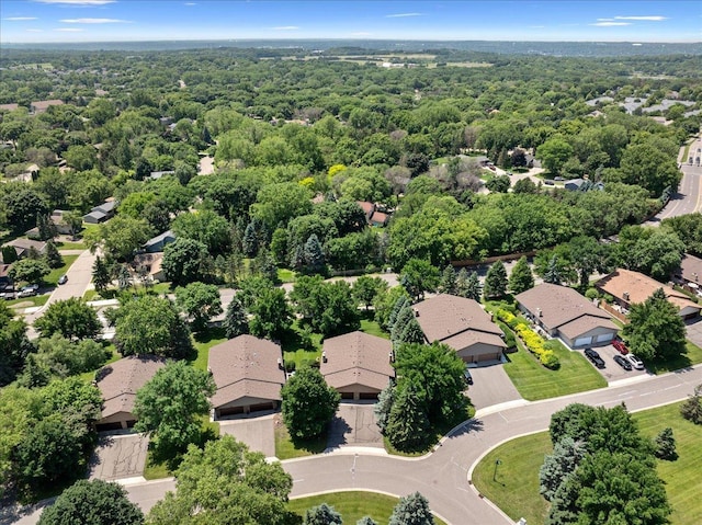 7079 Robinwood Trl, Woodbury, MN 55125 - aerial view of residential area with a heavily wooded area