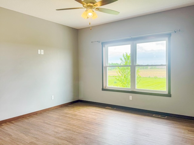 39847 447th St, Sauk Centre Twp, MN 56378 - empty room with light wood-style floors, a ceiling fan, and baseboards
